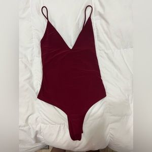 Women’s (S) red body suit!